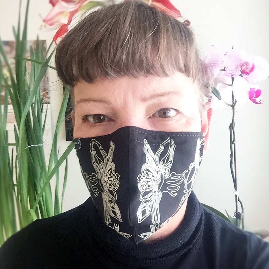 Natalija, Dock 5 artist, wearing a hand printed Columbine face cover
