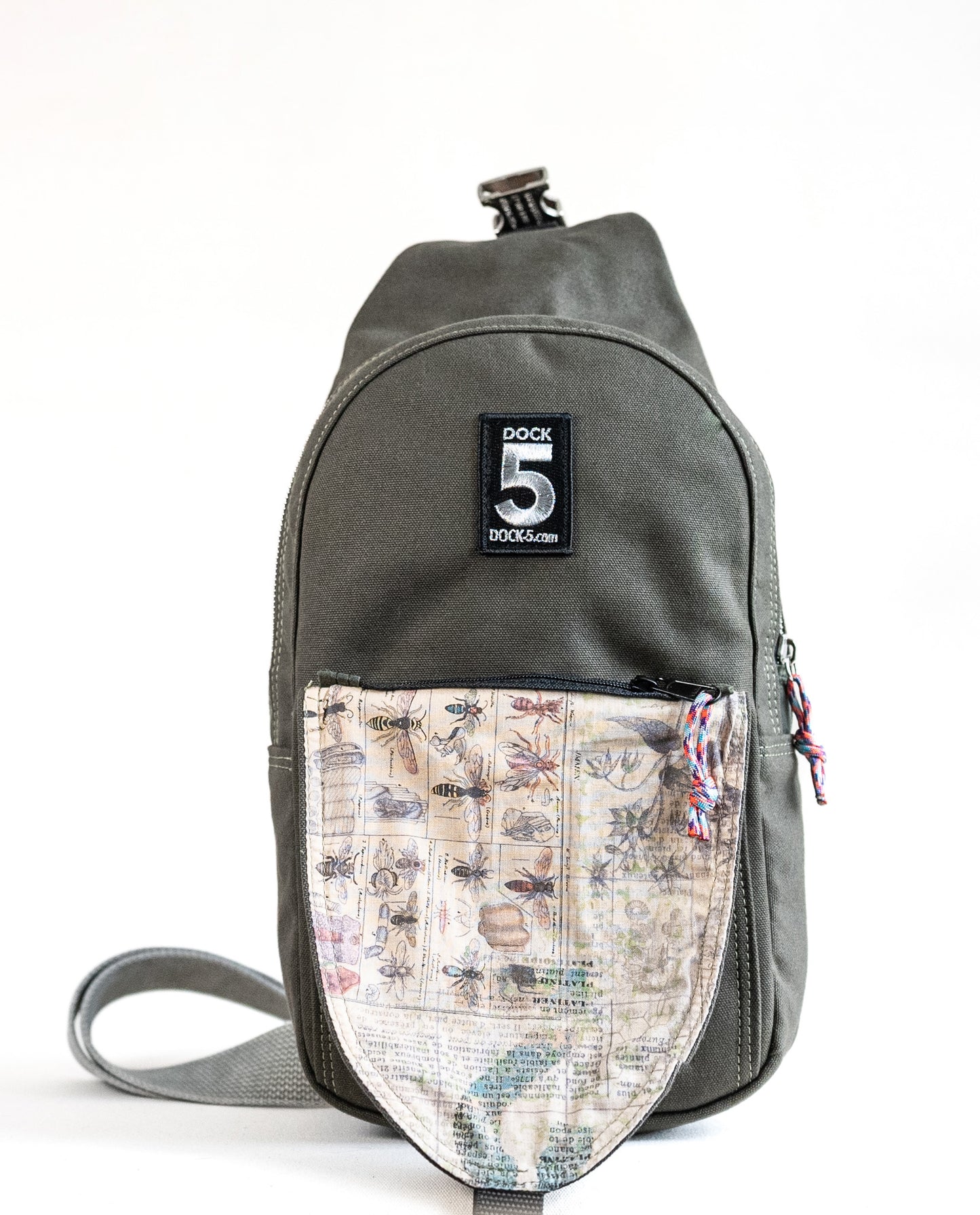 Dock 5’s hand-sewn Lupine Canvas Sling Bag is lined with a entomology print fabric