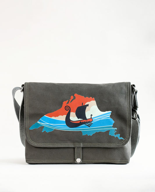 Front exterior of Dock 5’s Lake Superior Viking Ship Canvas Messenger Bag in olive featuring art by Natalija Walbridge