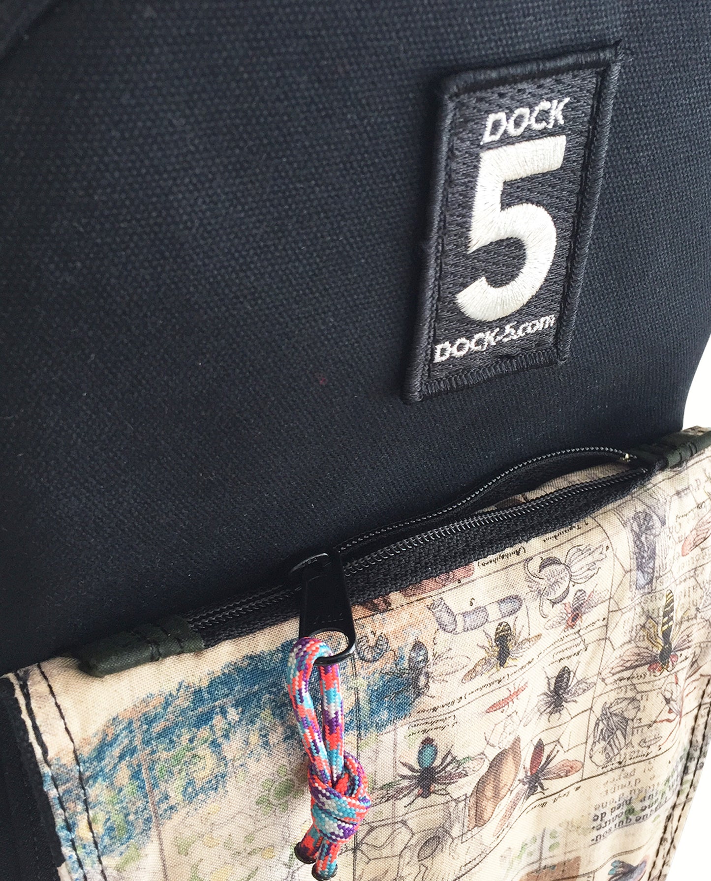 Front flap covers a zipper phone pocket, of Dock 5’s spacious, hand-sewn Dragonfly  Canvas Sling Bag