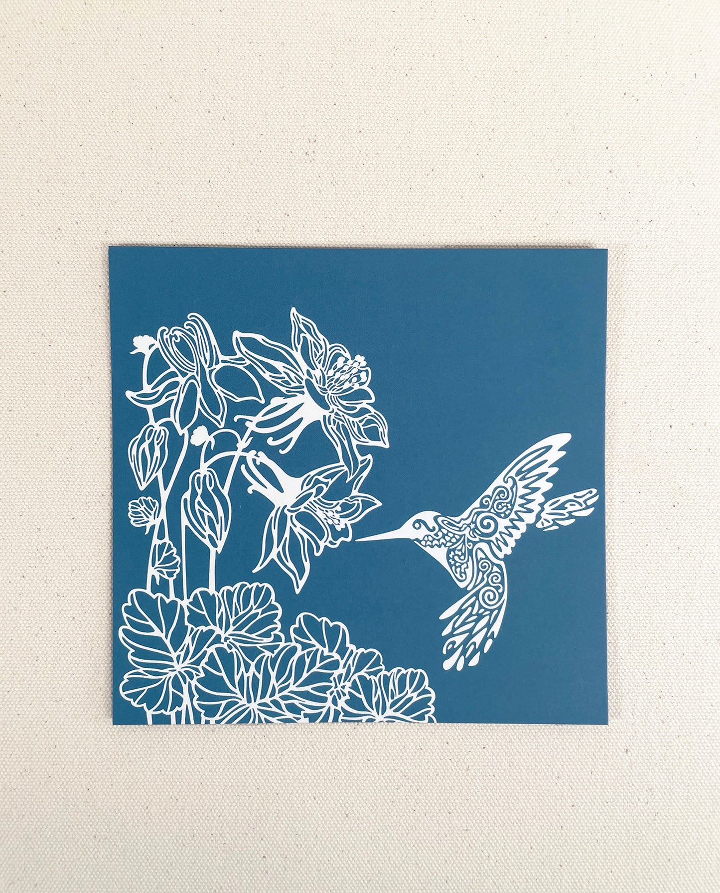 Hummingbird note card with blue background. Original art by Natalija Walbridge Dock 5